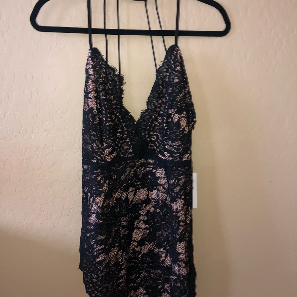 Black lace bodycon dress w/ slit